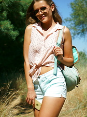 Sybil A playfully poses outdoors baring her luscious body.