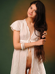 Connie's natural beauty with her seemingly innocent allure accentuated by her charming smile hypnotizes the viewer. But this angelic charmer can also tease as she starts showcasing her curvy body with even complexion and delicious pussy.