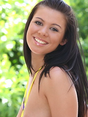 Here's young n' tanned beauty Destiny Moody enjoying another bikini weather day in the desert